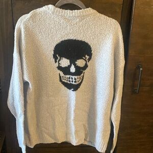 Skull Cashere sweater. Light bkue & black. Size M.